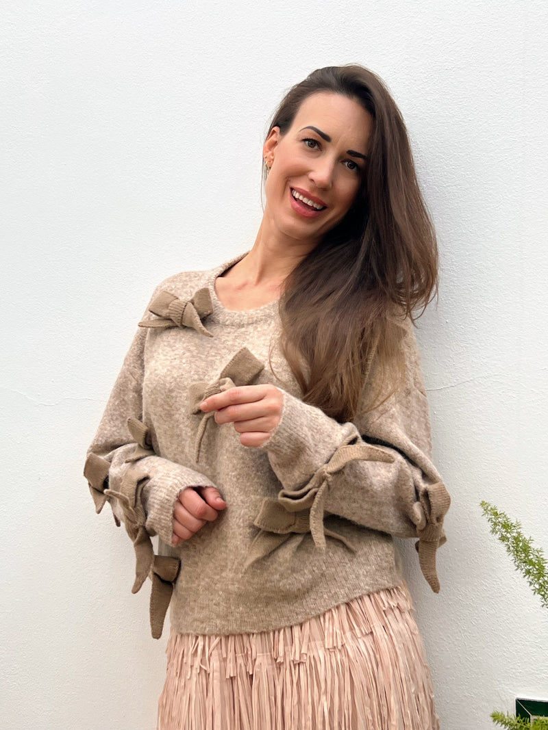 Jersey beige con lazos decorativos – Talla única