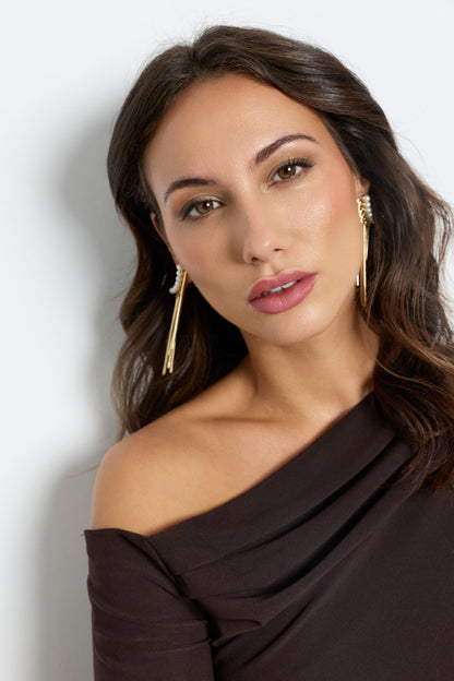 Body asimétrico con hebilla dorada – Elegancia y estilo en cada color El Vestidor de Inma